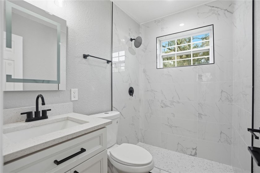 THE PROPERTY IS FULLY REMODELED! Beautiful 4 bedroom, 2 bath - photo 22