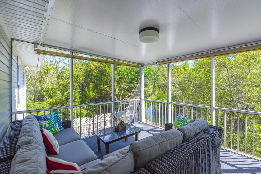 Located in the peaceful National Key Deer Refuge, this charming - photo 3