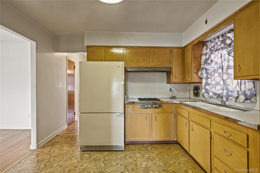 Welcome to this well-maintained two-family home offering an - photo 15
