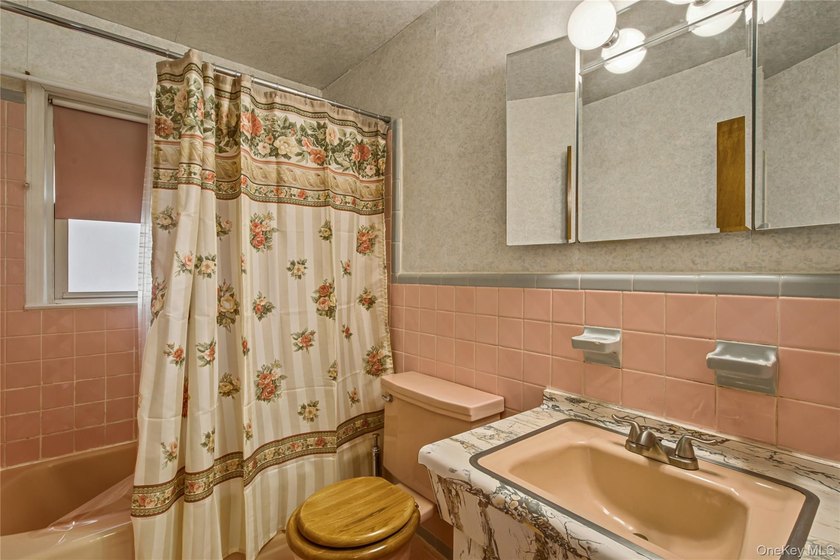 Welcome to this well-maintained two-family home offering an - photo 18