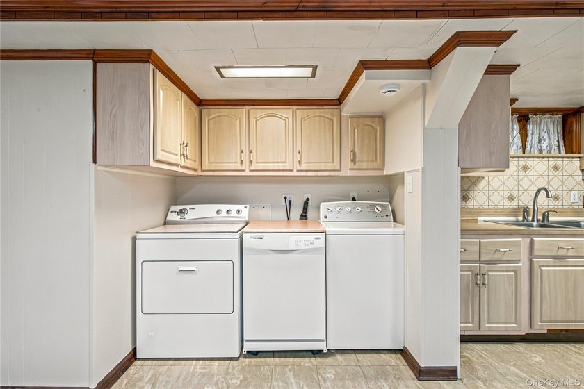 Welcome to this well-maintained two-family home offering an - photo 21