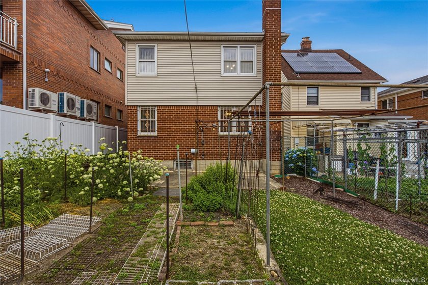 Welcome to this well-maintained two-family home offering an - photo 23