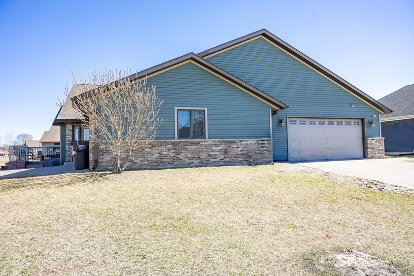 Each unit features a spacious, open~concept layout where the - photo 4
