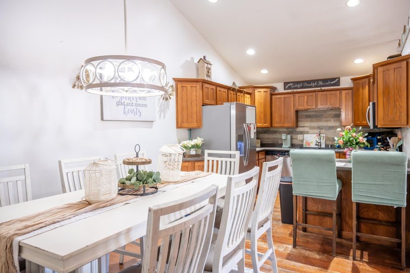 Each unit features a spacious, open~concept layout where the - photo 9
