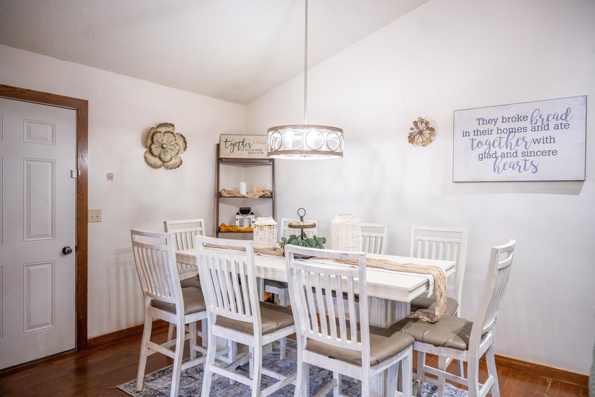 Each unit features a spacious, open~concept layout where the - photo 10