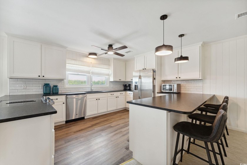 LOWEST PRICED OCEANFRONT HOME IN PAWLEYS ISLAND OR LITCHFILED - photo 8