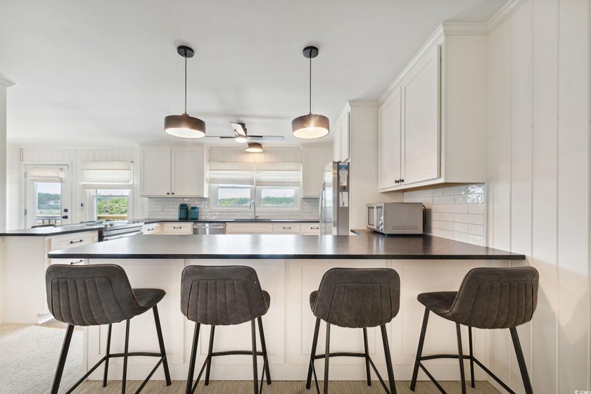 LOWEST PRICED OCEANFRONT HOME IN PAWLEYS ISLAND OR LITCHFILED - photo 9