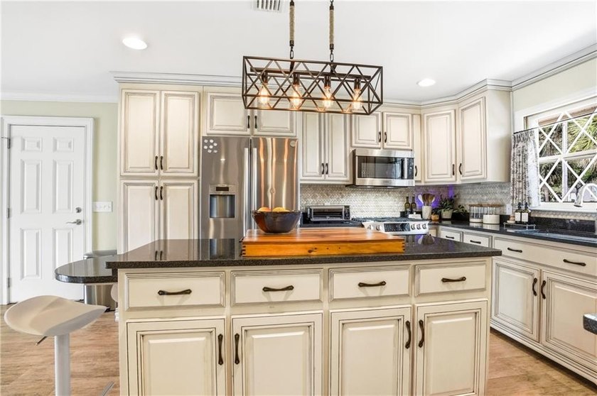 Experience the ultimate coastal lifestyle in this stunning - photo 15