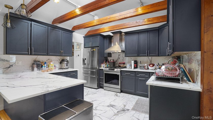Welcome to this spacious Hi-Ranch in the heart of Bellmore - photo 6