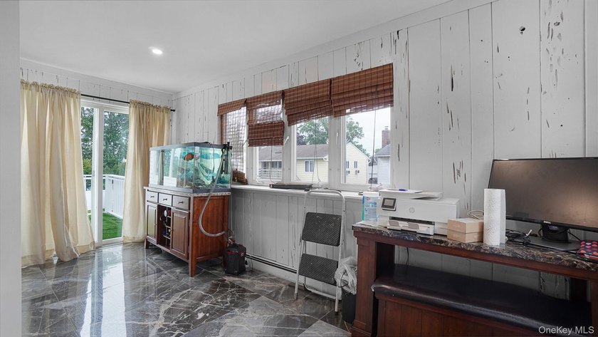 Welcome to this spacious Hi-Ranch in the heart of Bellmore - photo 8