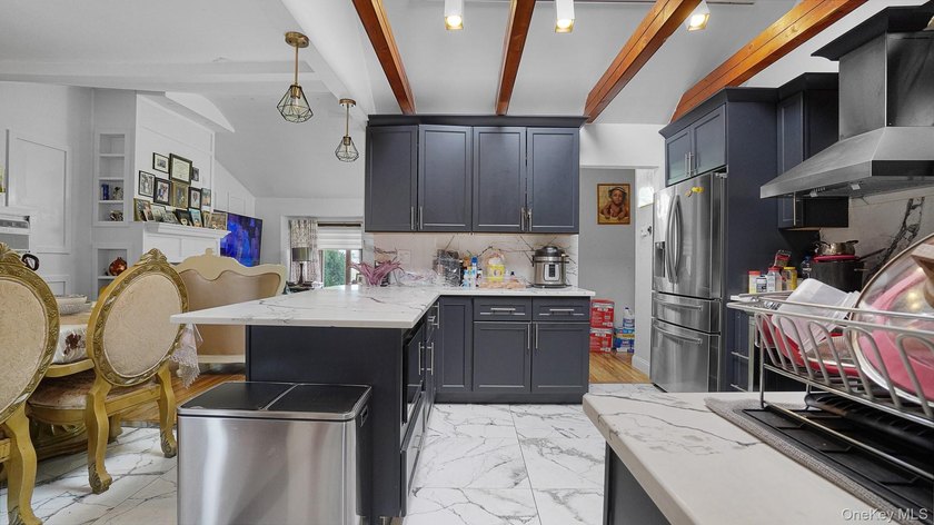 Welcome to this spacious Hi-Ranch in the heart of Bellmore - photo 9
