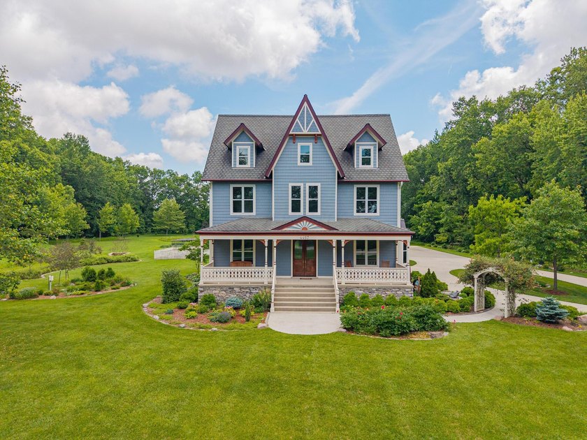 Custom built in 2007 and nestled in complete privacy on nearly 6 - photo 2