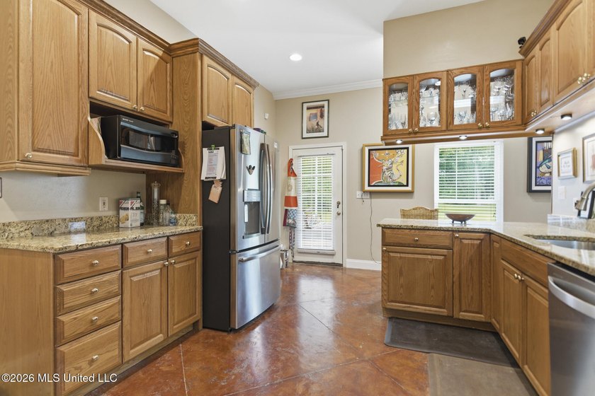 Welcome home to this charming 3-bedroom, 2-bath residence in the - photo 12