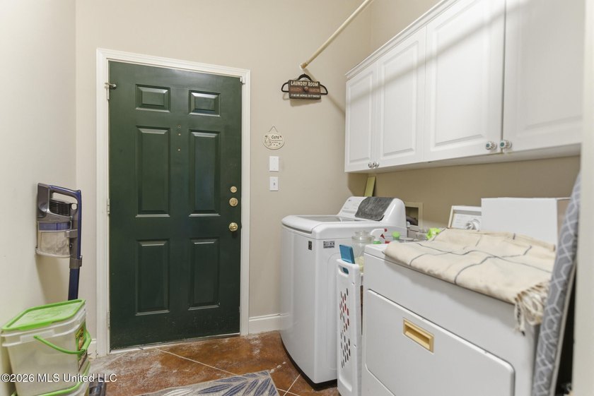 Welcome home to this charming 3-bedroom, 2-bath residence in the - photo 22