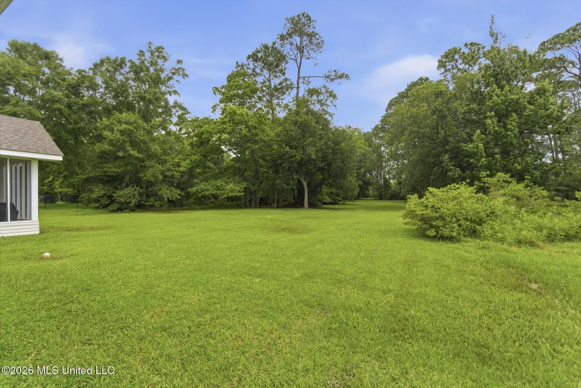 Welcome home to this charming 3-bedroom, 2-bath residence in the - photo 24