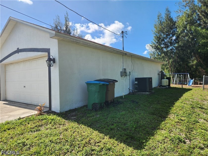 Lots of room in this home on a quiet street in NW Cape Coral - photo 3