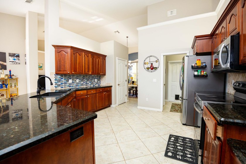 Step into this meticulously maintained 2006 CBS built home - photo 11