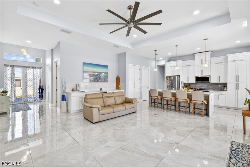 Welcome to this expansive and beautifully designed 4-bedroom - photo 5