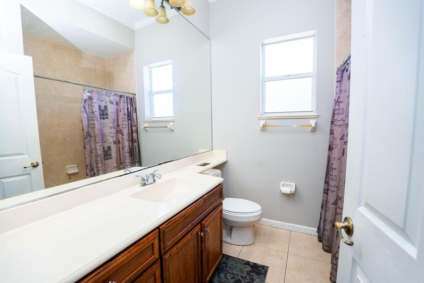 Step into this meticulously maintained 2006 CBS built home - photo 15