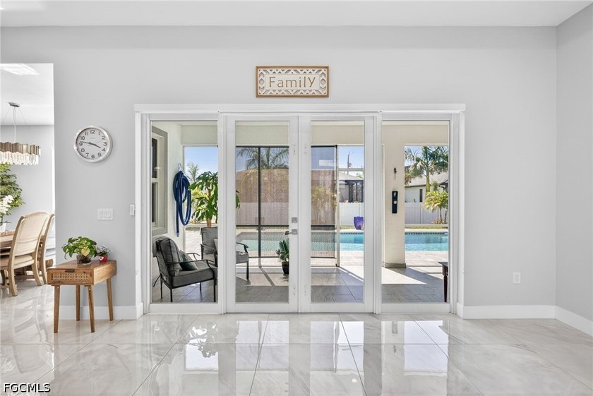 Welcome to this expansive and beautifully designed 4-bedroom - photo 8