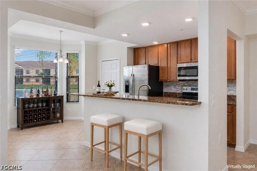 Welcome to this beautifully maintained first floor condo in the - photo 7