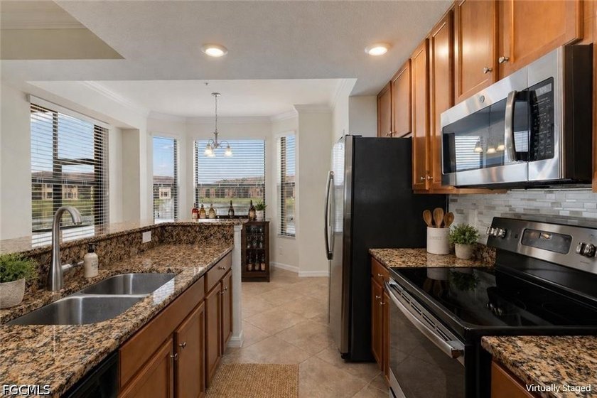 Welcome to this beautifully maintained first floor condo in the - photo 10