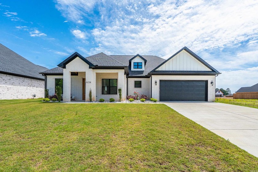 Discover luxury lake area living in the highly sought after - photo 3