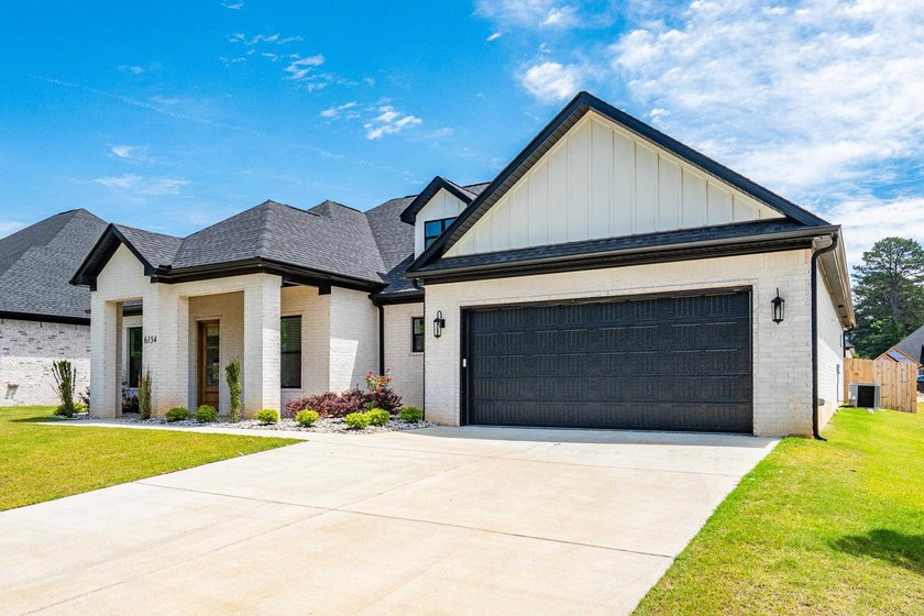 Discover luxury lake area living in the highly sought after - photo 4