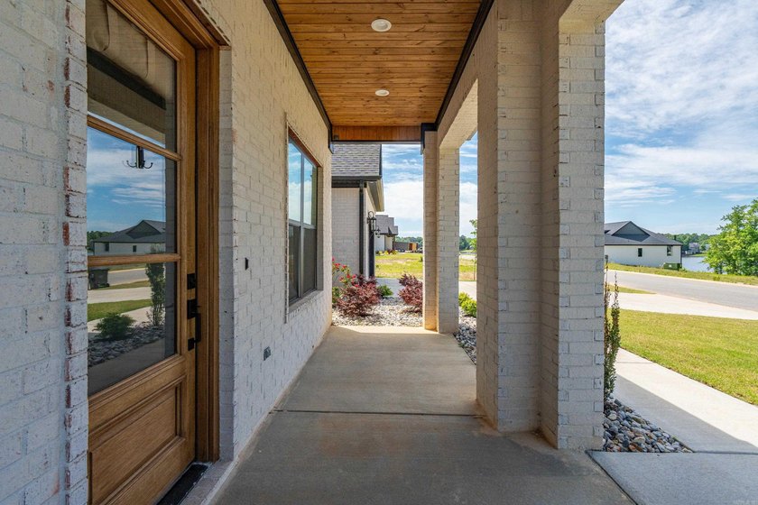 Discover luxury lake area living in the highly sought after - photo 7
