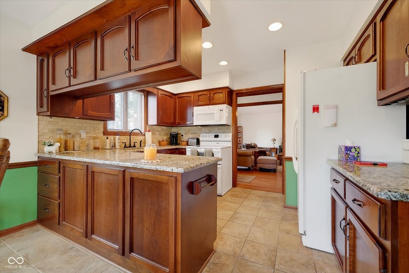 Charming Ranch Condo in Library Park! Welcome home to this - photo 12