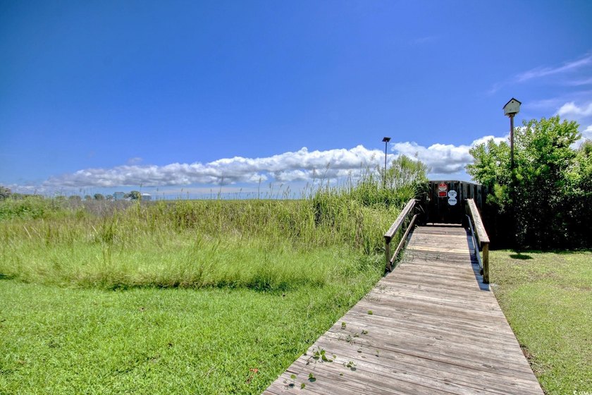 Create your coastal retreat in the charming waterfront community - photo 6