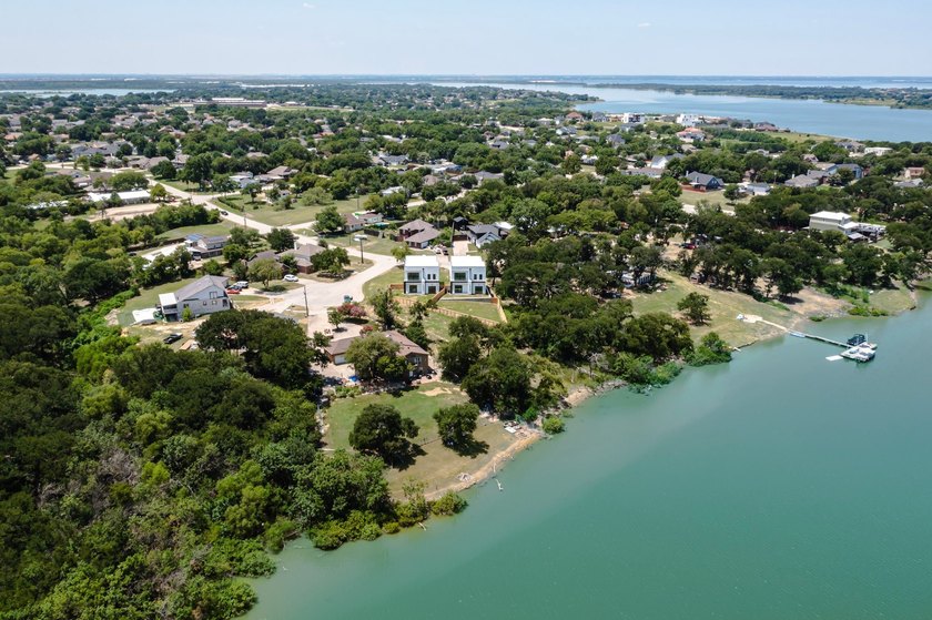 Experience modern waterfront luxury in this stunning - photo 4