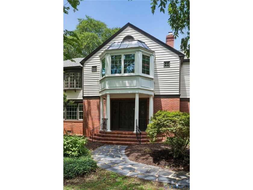 Hidden among mature trees on a rare double lot, this exceptional - photo 7