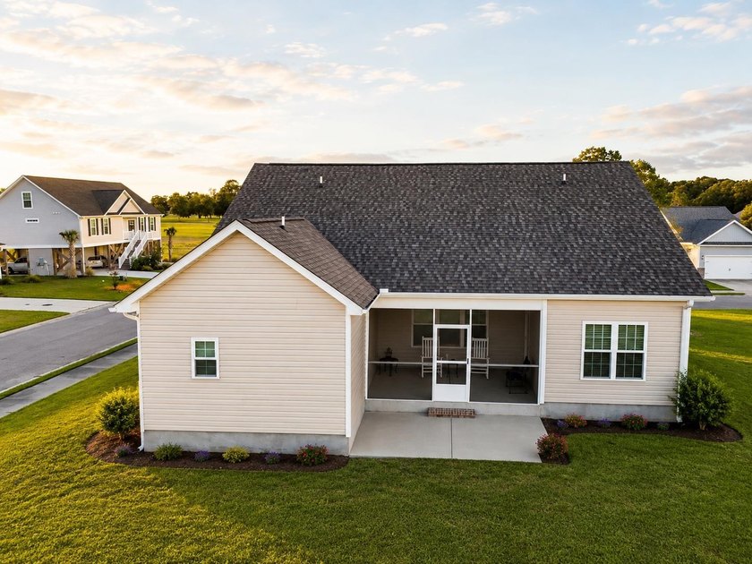 Welcome to coastal living at its finest in the sought-after - photo 24
