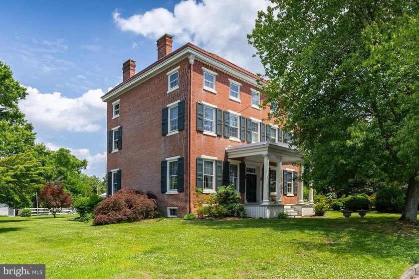 Circa....1848 This handsome brick Greek Revival period home in - photo 3