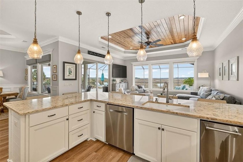 Welcome to a refined coastal sanctuary in the gated enclave of - photo 18