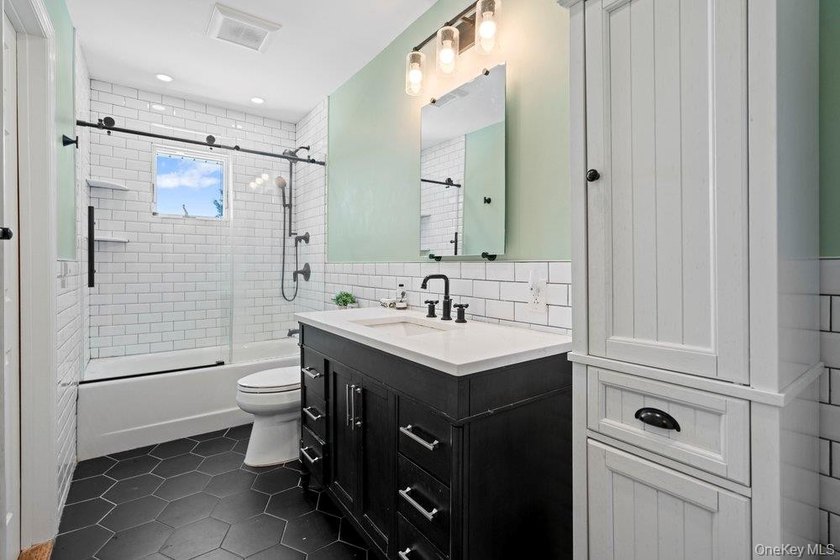 Welcome to 60 Leewater Ave. This sprawling split-level three - photo 19