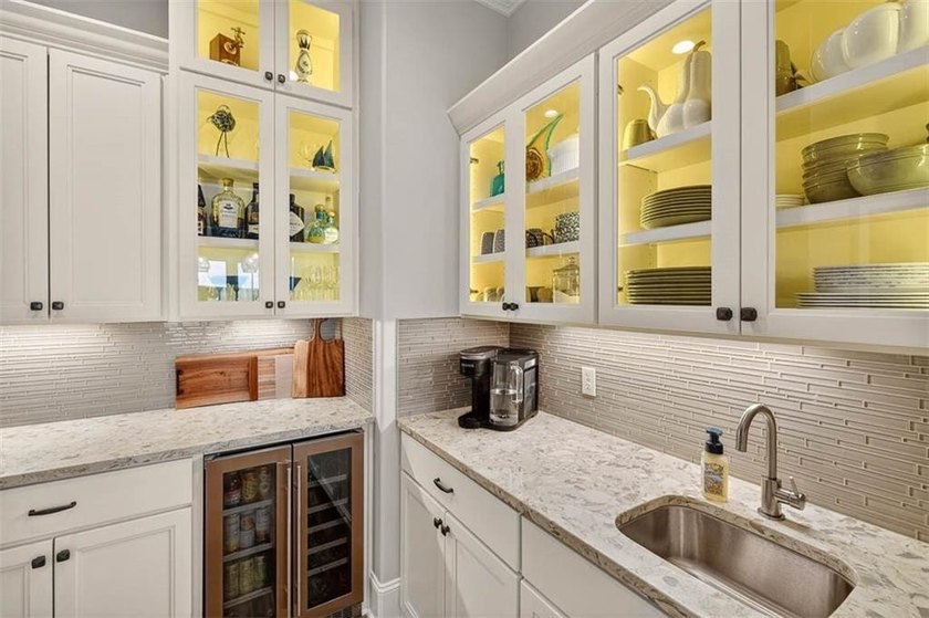Welcome to a refined coastal sanctuary in the gated enclave of - photo 22