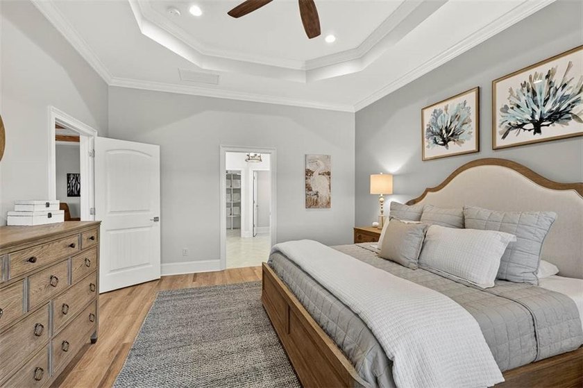 Welcome to a refined coastal sanctuary in the gated enclave of - photo 26