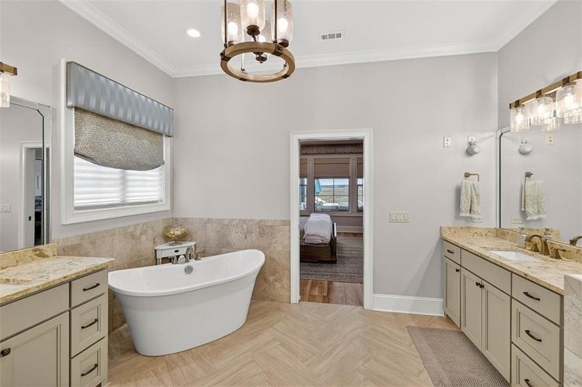 Welcome to a refined coastal sanctuary in the gated enclave of - photo 27