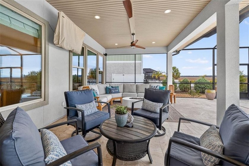 Welcome to a refined coastal sanctuary in the gated enclave of - photo 44