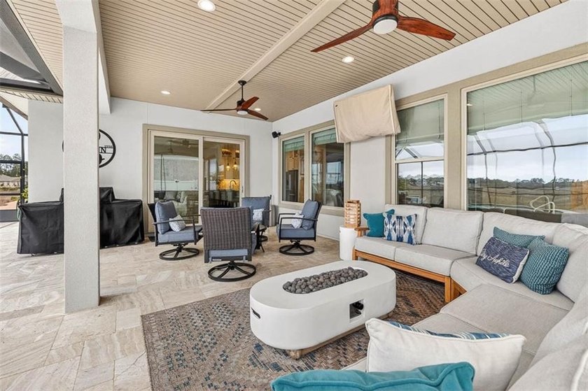 Welcome to a refined coastal sanctuary in the gated enclave of - photo 45