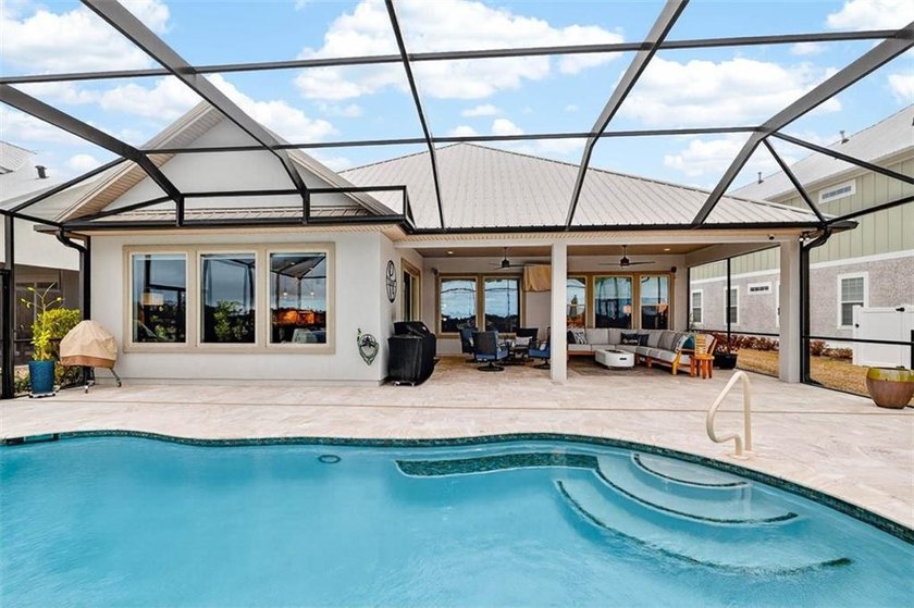 Welcome to a refined coastal sanctuary in the gated enclave of - photo 46