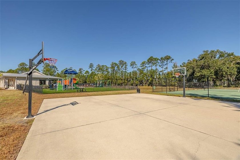 Welcome to a refined coastal sanctuary in the gated enclave of - photo 52