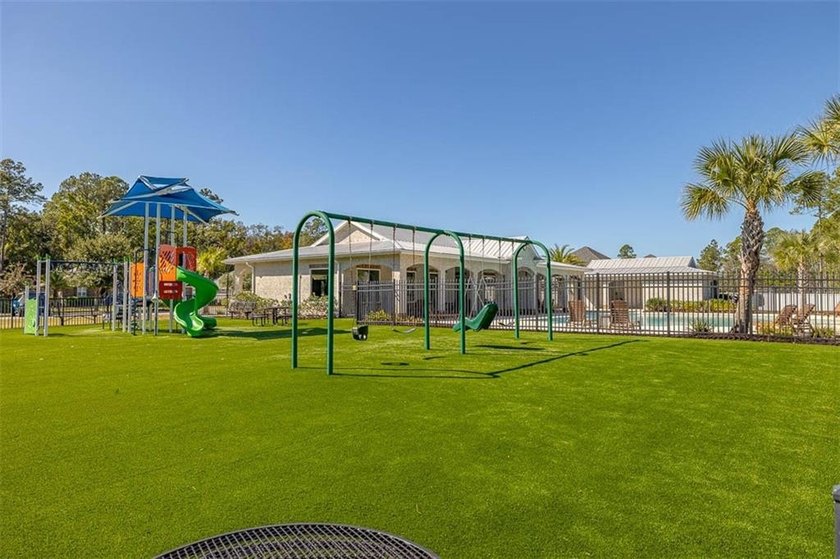 Welcome to a refined coastal sanctuary in the gated enclave of - photo 54