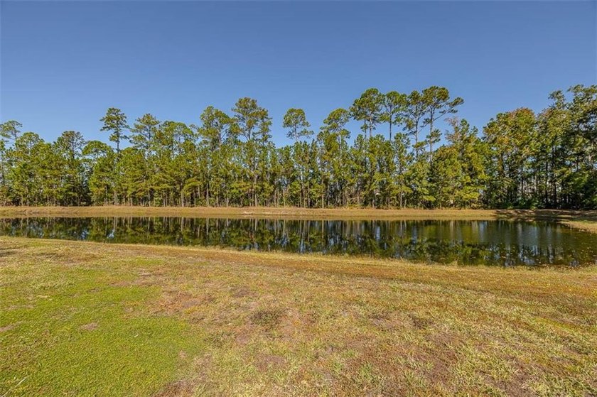 Welcome to a refined coastal sanctuary in the gated enclave of - photo 55