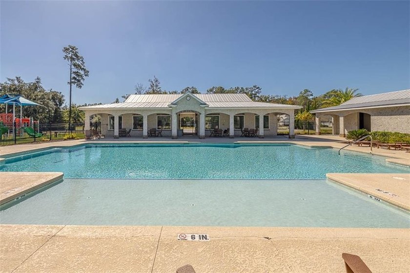 Welcome to a refined coastal sanctuary in the gated enclave of - photo 57