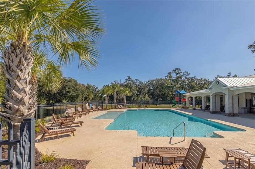 Welcome to a refined coastal sanctuary in the gated enclave of - photo 58