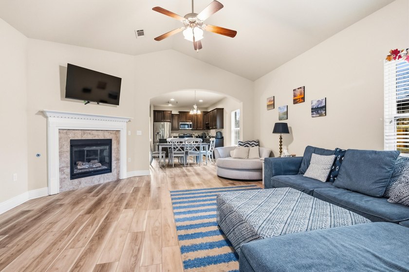 Newer LVP flooring flows through this open-concept Hammock Bay - photo 13