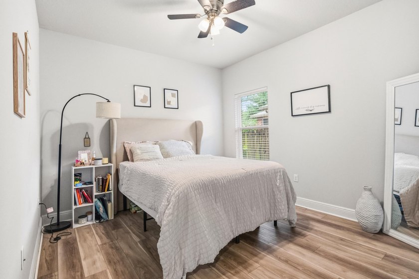 Newer LVP flooring flows through this open-concept Hammock Bay - photo 24